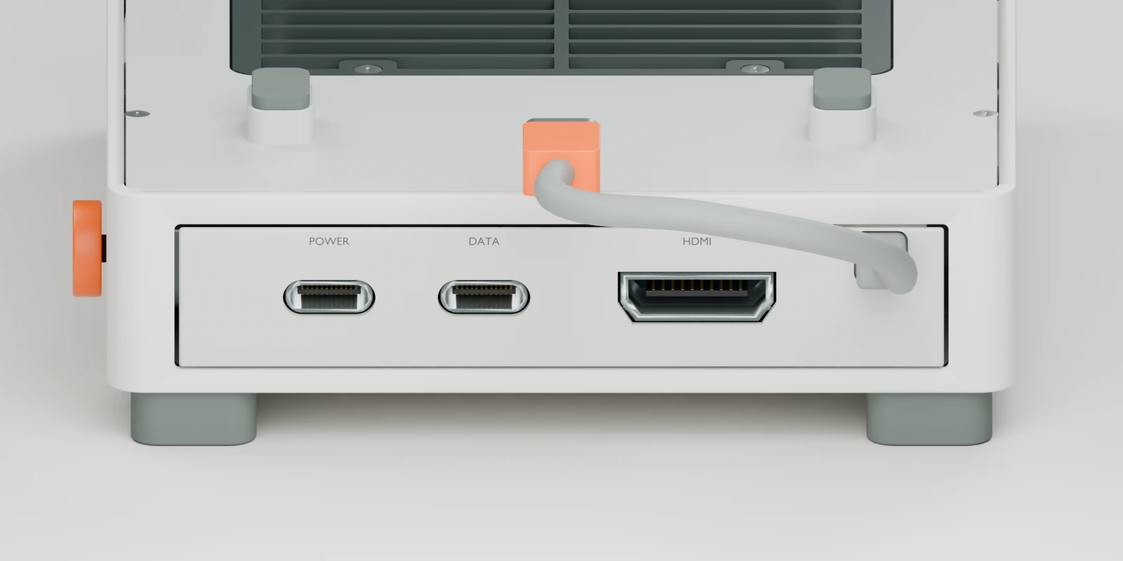 V11 side panel with adjacent USB-C POWER and DATA sockets, followed by HDMI and the separate captive host-cable exit.